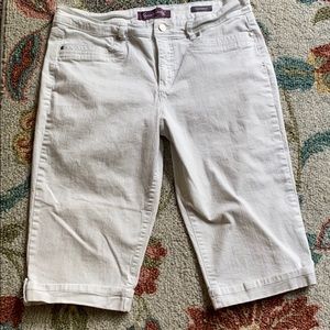 White jean capris, hits right below the knee
